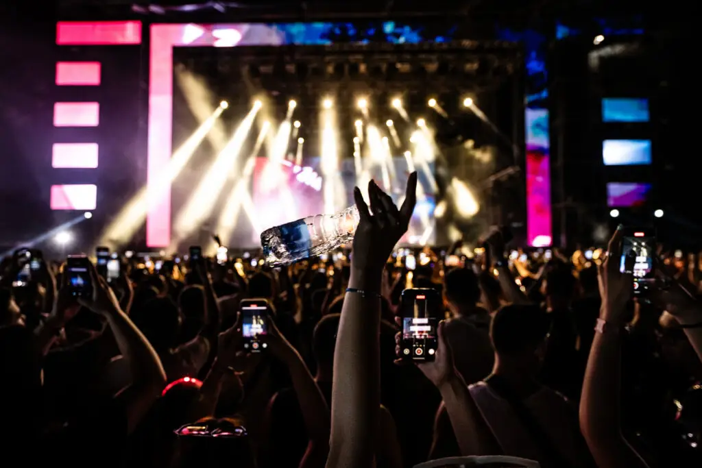 People enjoying festival season, music concert
